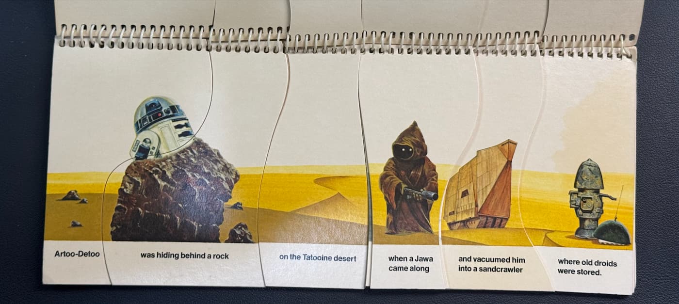 Photo of the interior of the Star Wars: Empire Strikes Back Mix or Match Storybook. Six panels have been matched (not mixed) to form this coherent sentence: "Artoo-Detoo | was hiding behind a rock | on the Tatooine desert | when a Jawa came along | and vacuumed him into a sandcrawler | where old droids where stored."