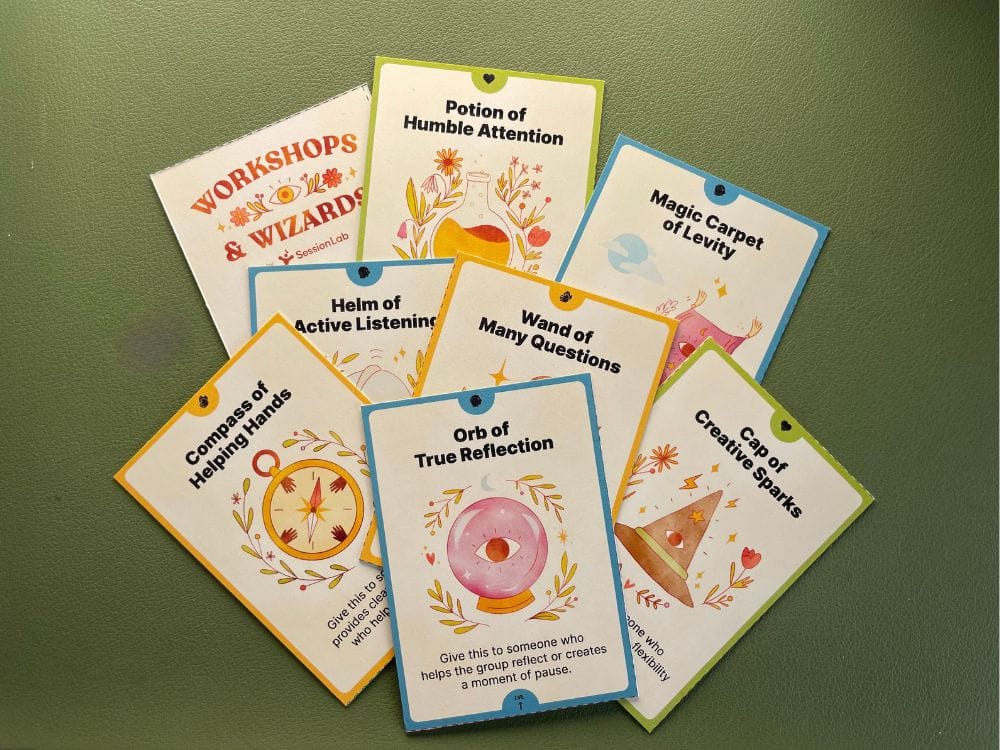 An assortment of cards each with a title, illustration, short description, and one of three differently colored borders. Titles include things like "Orb of True Reflection" "Compass of Helping Hands" "Cap of Creative Sparks" and "Wand of Many Questions"