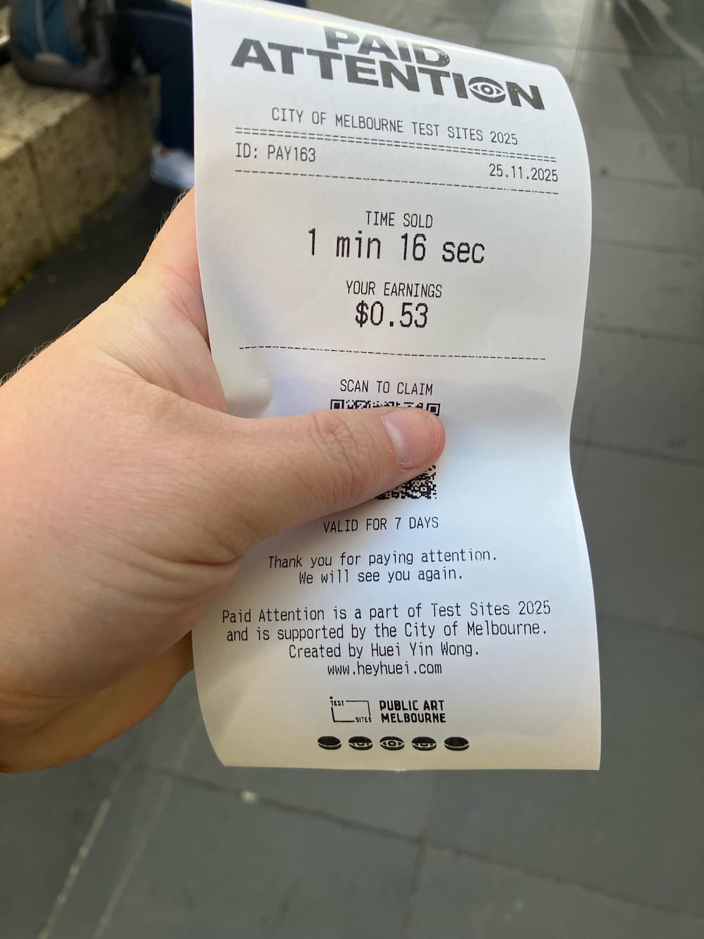 A receipt that says paid attention city of Melbourne test sites. Time sold 1 min 16 seconds. Your earnings $0.53 thank you for paying attention we will see you again. A claim QR code is obscured
